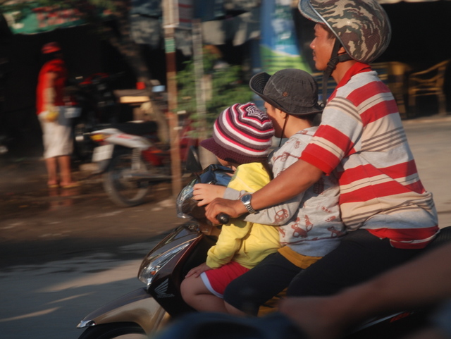 Family transportation, Mekong Delta, Vietnam 