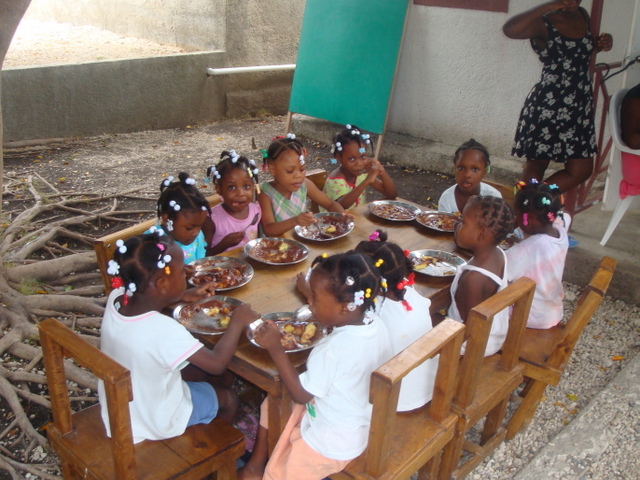 Children enjoying their meal together